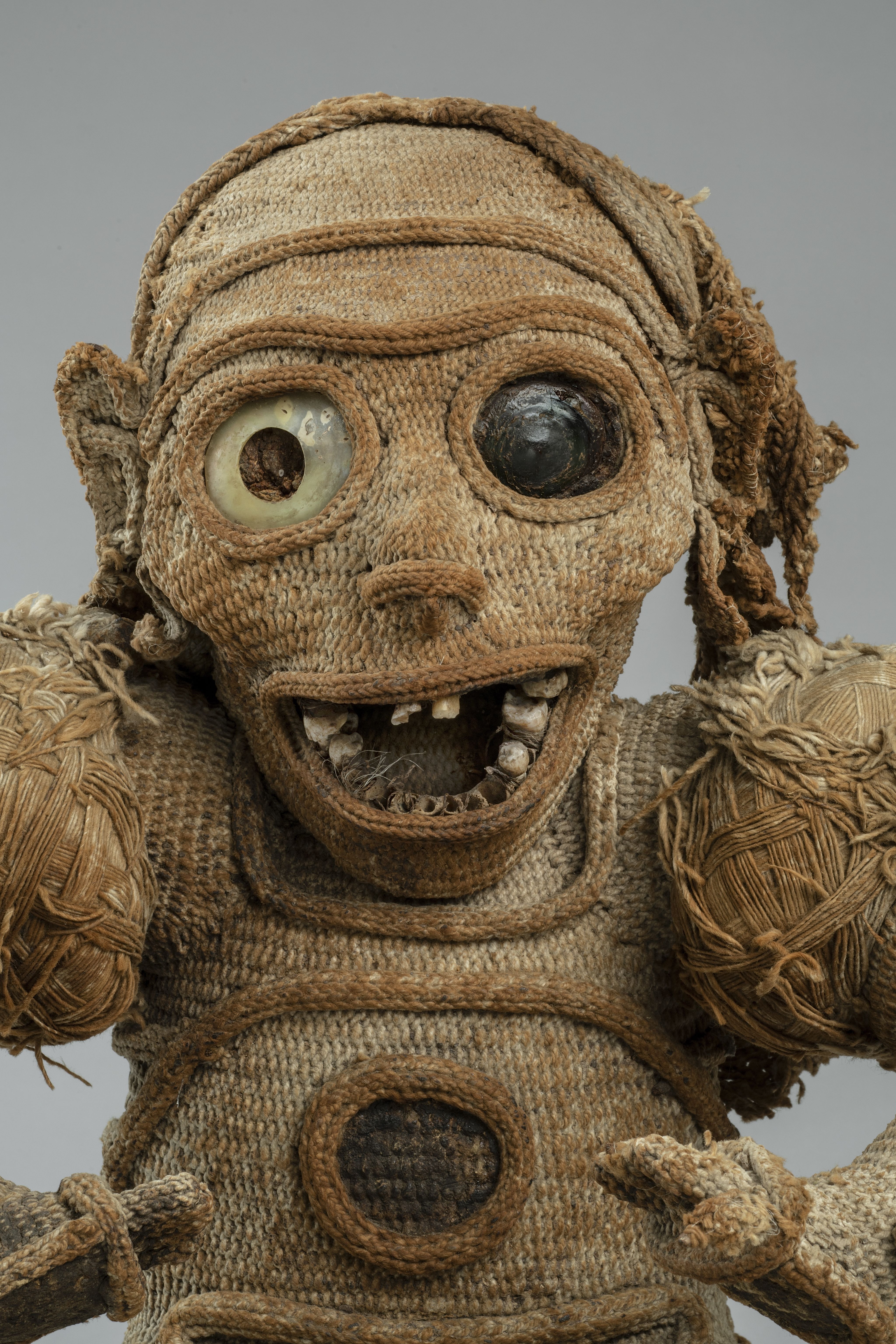 A vase with a flower in it sitting on a table